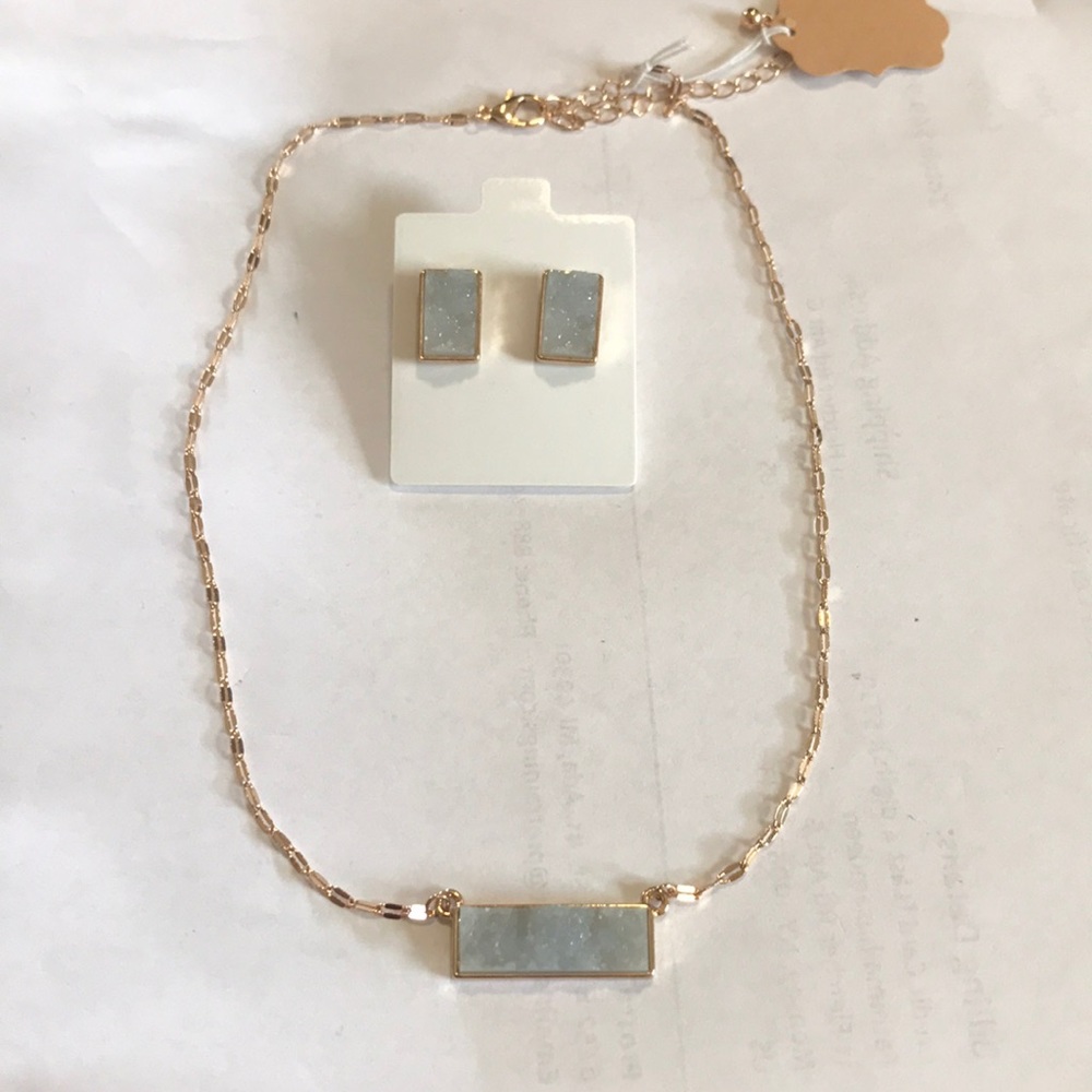 Gold color chain with crystal pendant